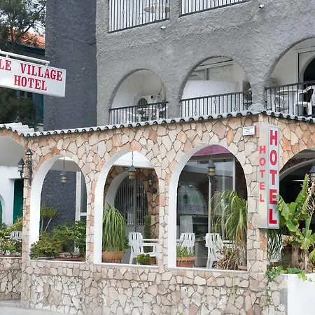 Le Village Hotel *